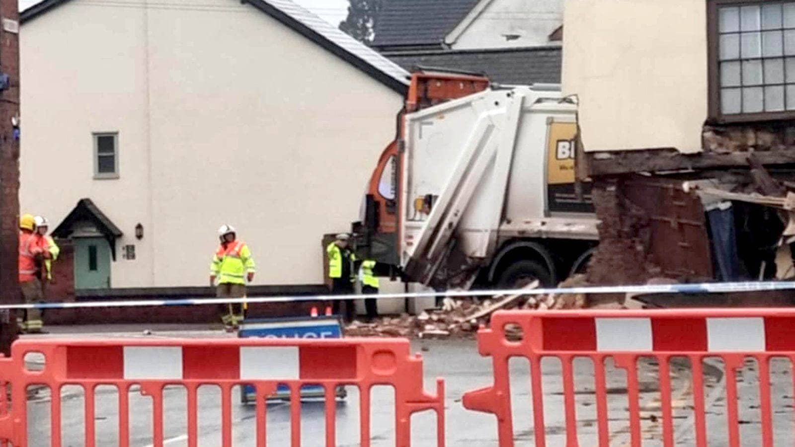 Bin lorry crashes into building leaving one dead and two injured