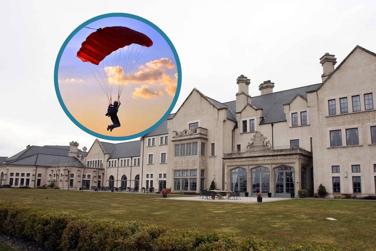 Moment paraglider crashes into luxury hotel