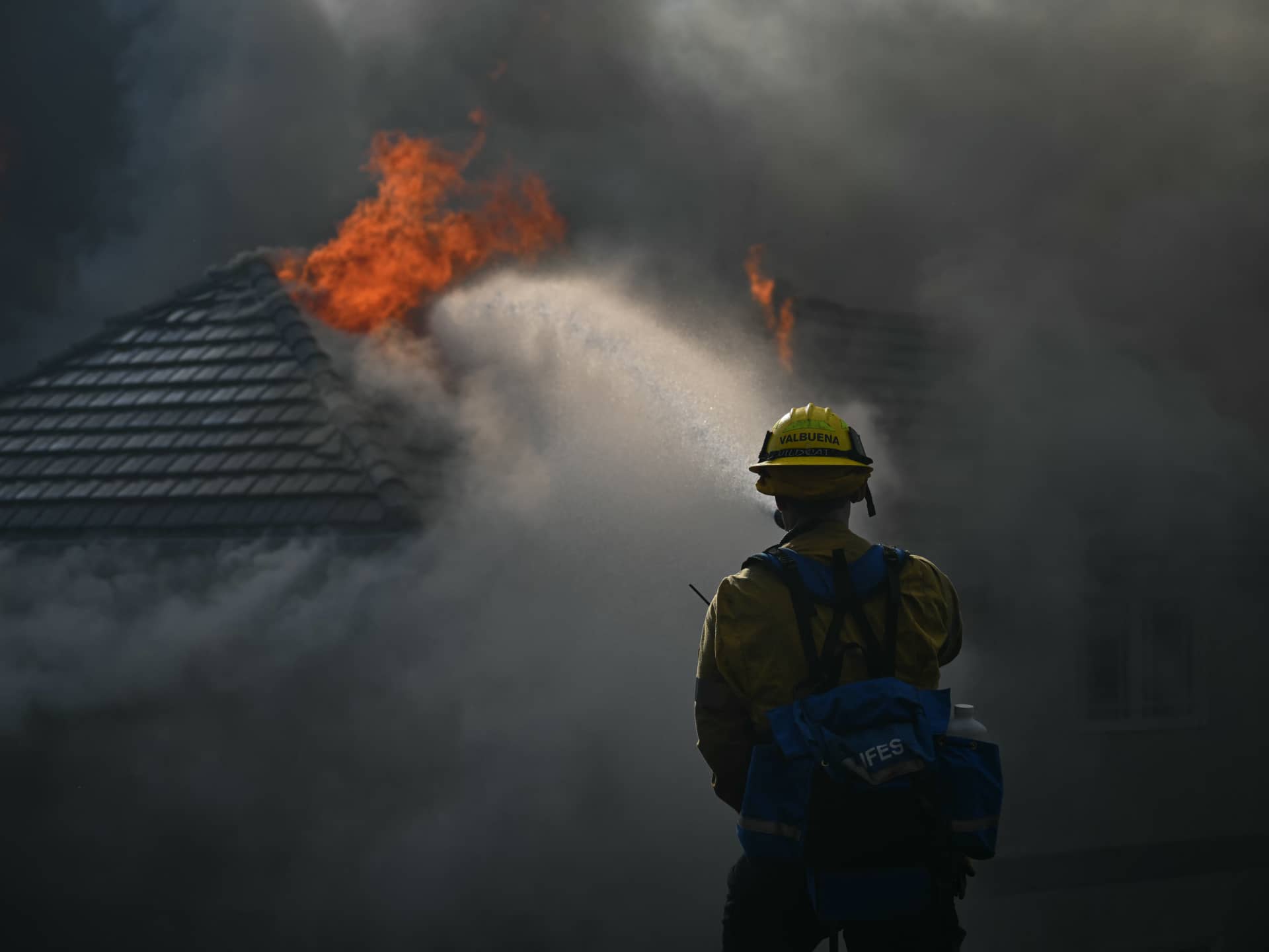 Southern California wildfire damages homes and forces evacuations in Orange County