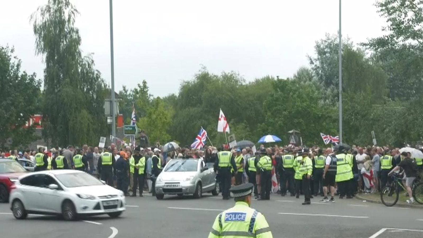 There seems no end in sight to asylum hotel protests as five intense minutes by a roundabout in Norwich proved