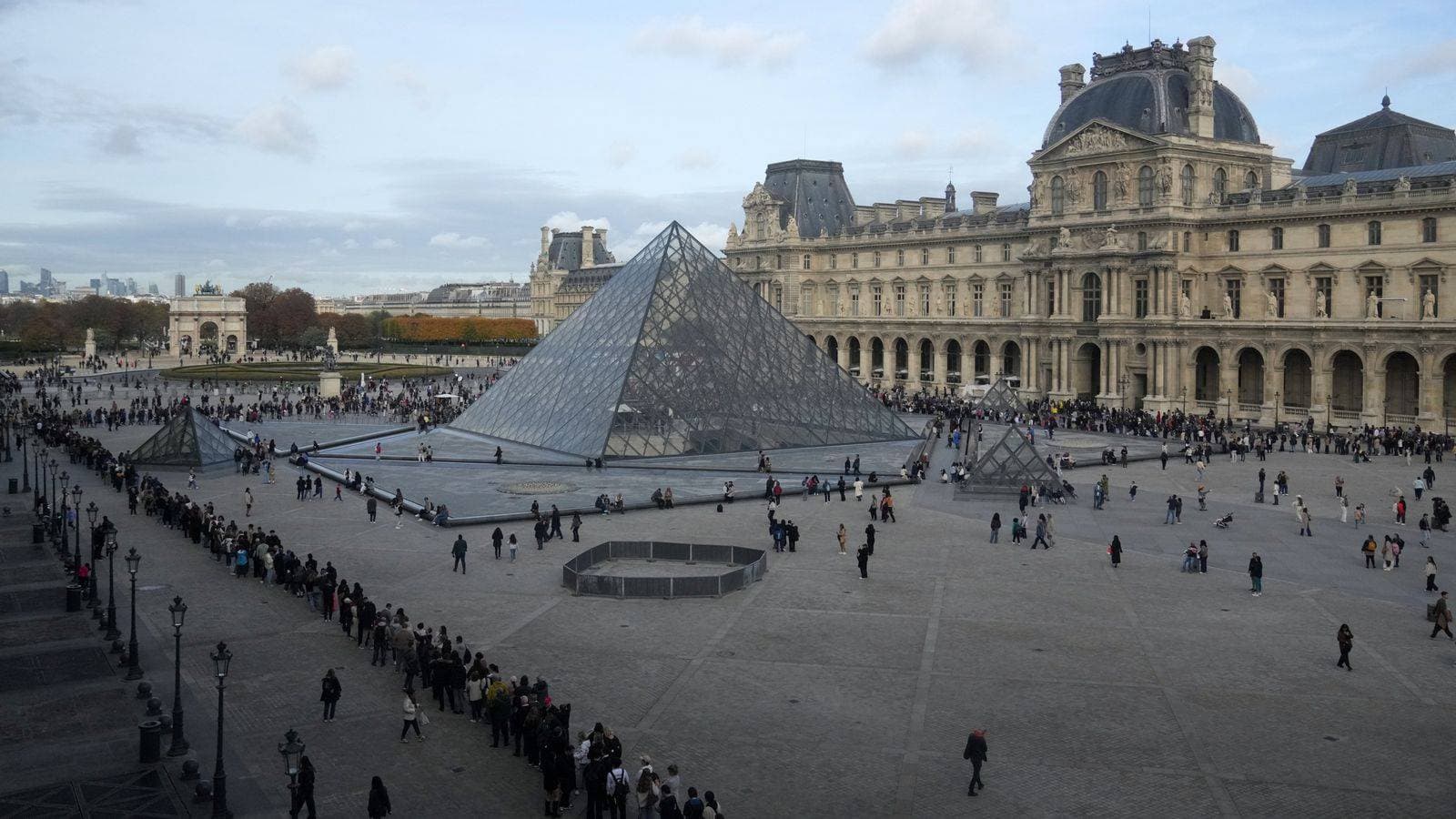 Woman, 38, charged in connection with Louvre jewellery heist