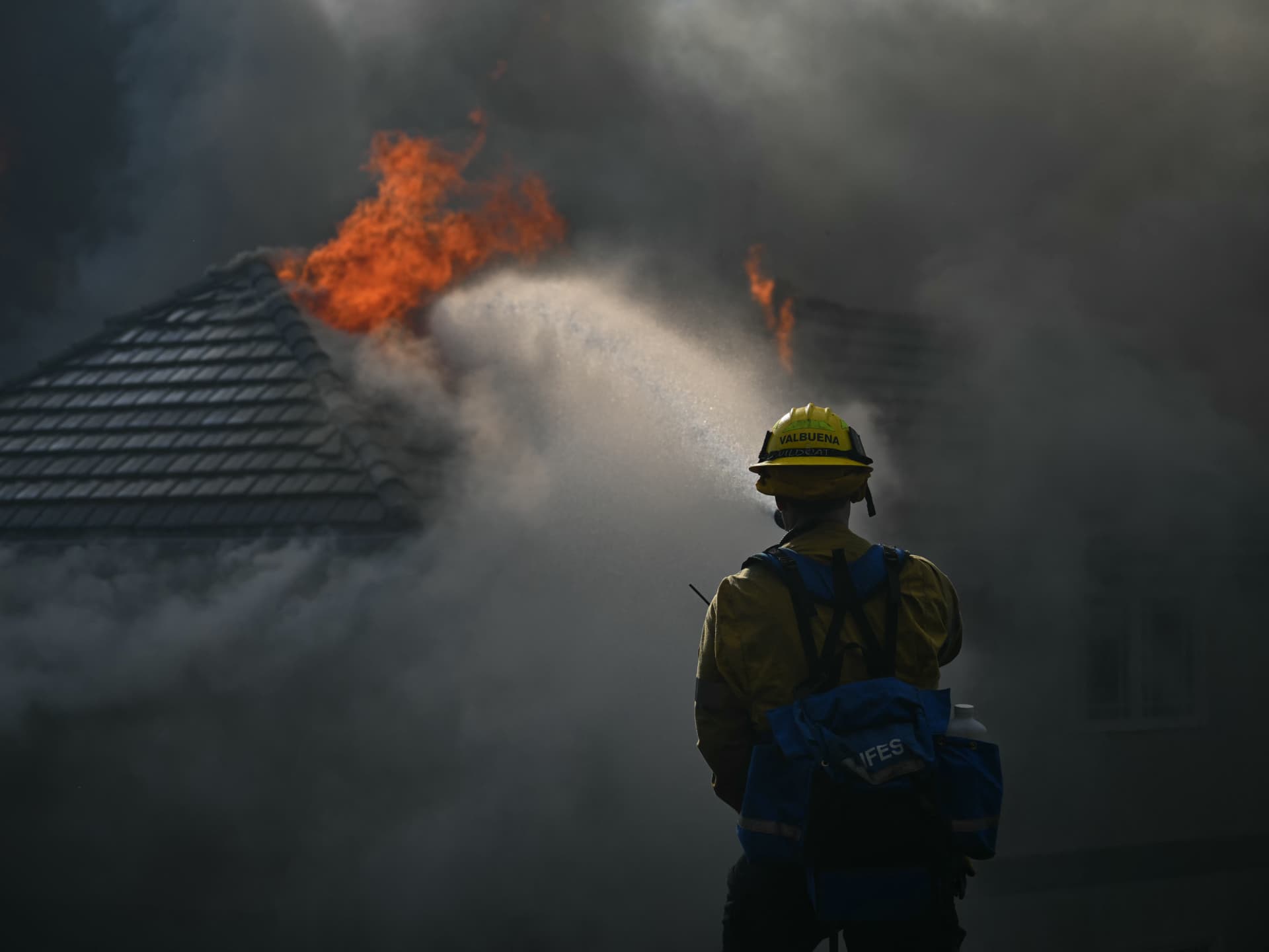 Southern California wildfire damages homes and forces evacuations in Orange County