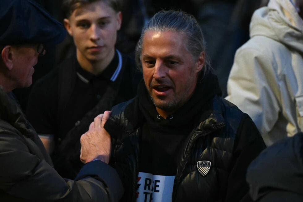 Ten British far-right activists barred from France for migrant harassment