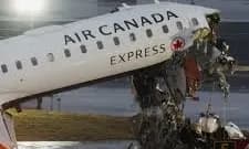 Air Canada plane collides with fire truck at LaGuardia Airport killing two pilots Air Canada plane collides with fire truck at LaGuardia Airport killing two pilots