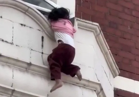 Muslim Immigrant hero who rescued girl from window ledge used cricket skills to catch her