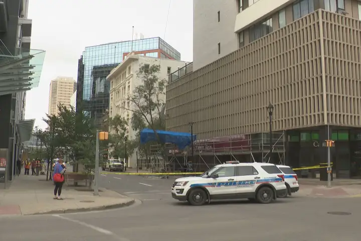 Two people hospitalised after scaffolding falls in downtown Regina