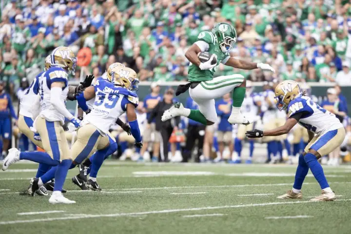 Roughriders win in overtime against Blue Bombers as Stevens scores three TDs