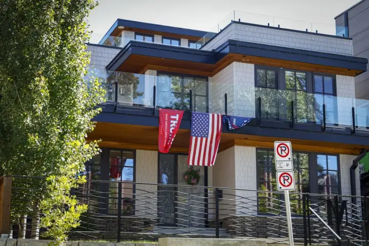 Calgary home displaying pro-Trump flags vandalised during trade tensions
