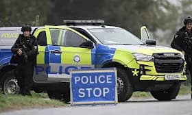 Bomb squad searches vans near UK air base as five men arrested for terrorism Bomb squad searches vans near UK air base as five men arrested for terrorism